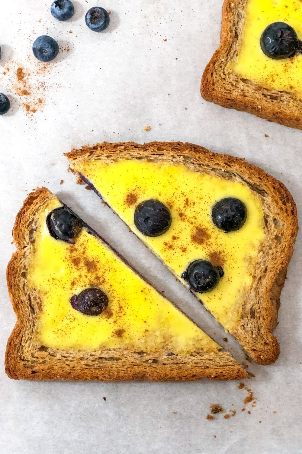 tiktok custard toast with blueberries and cinnamon