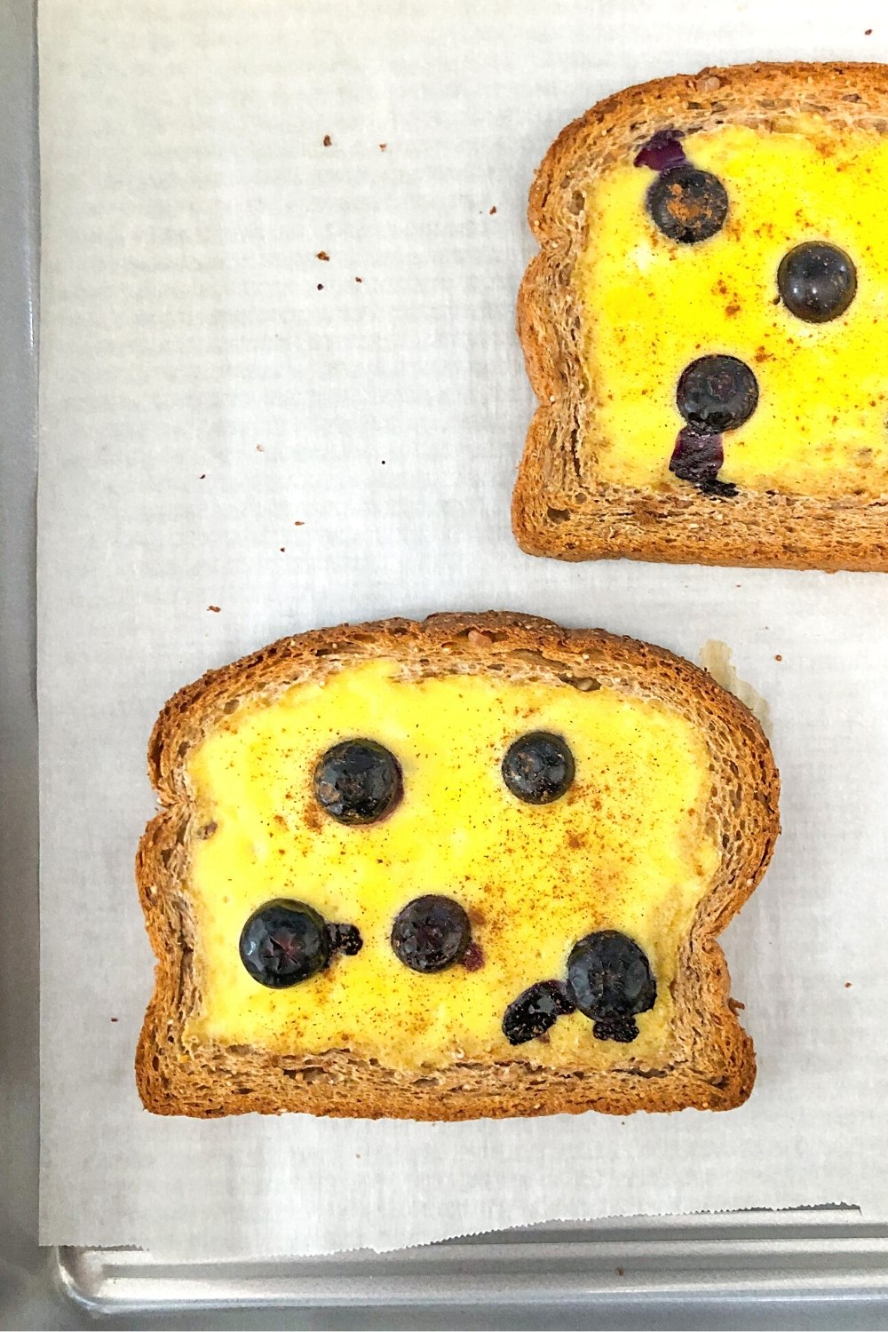 bread on a sheet pan with parchment paper