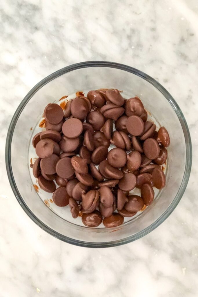dark chocolate chips in a glass bowl