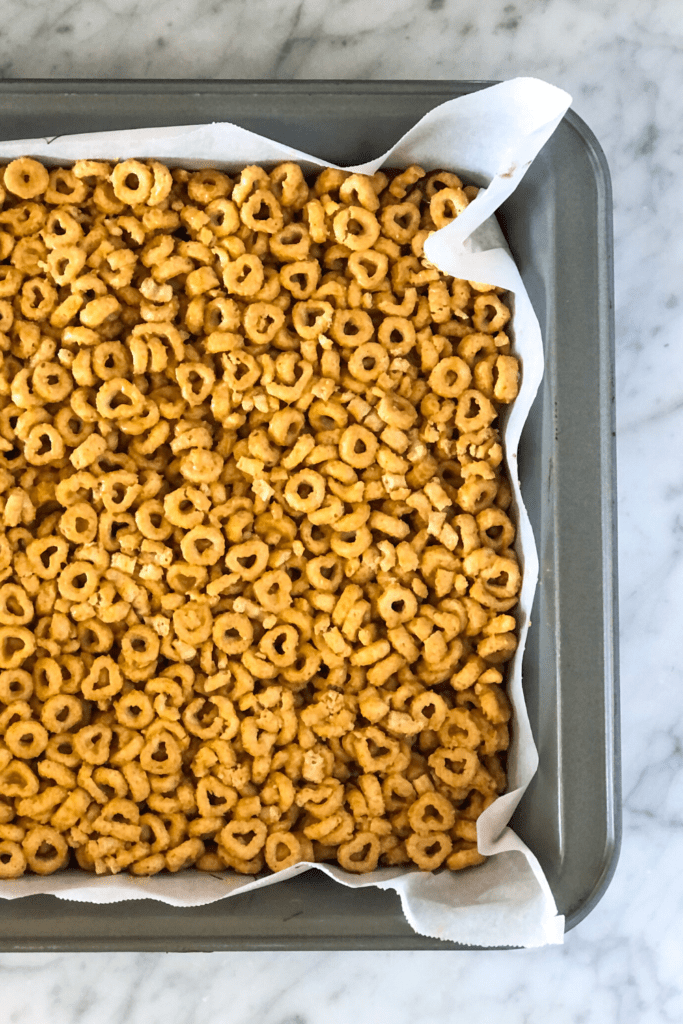 cheerio bar mixture pressed into pan