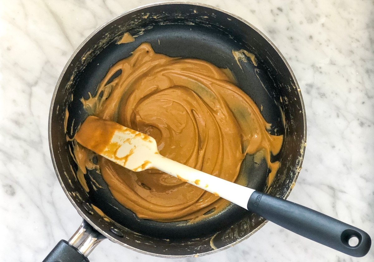peanut butter honey mixture in a saucepan