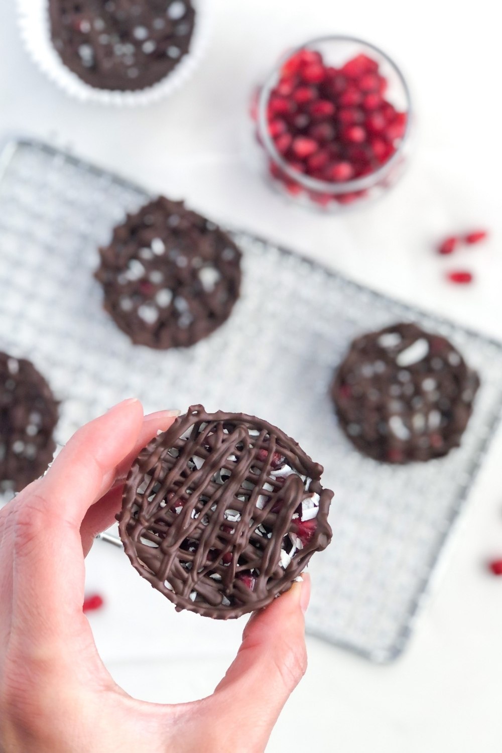 chocolate cups with pomegranate seeds and shredded coconut