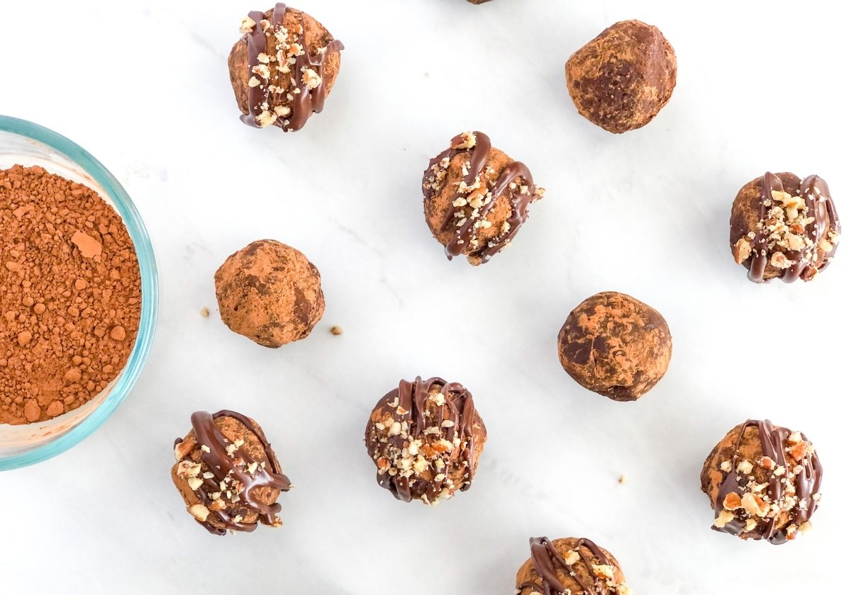 chocolate avocado truffles with pecans and rolled in cocoa powder