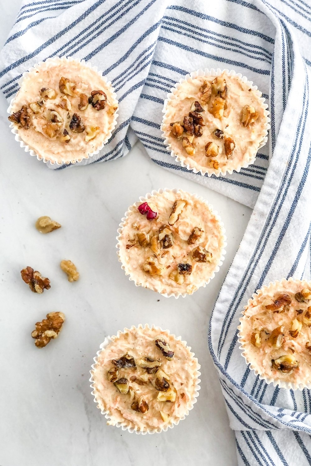 mini no bake carrot cake cheesecakes topped with walnuts
