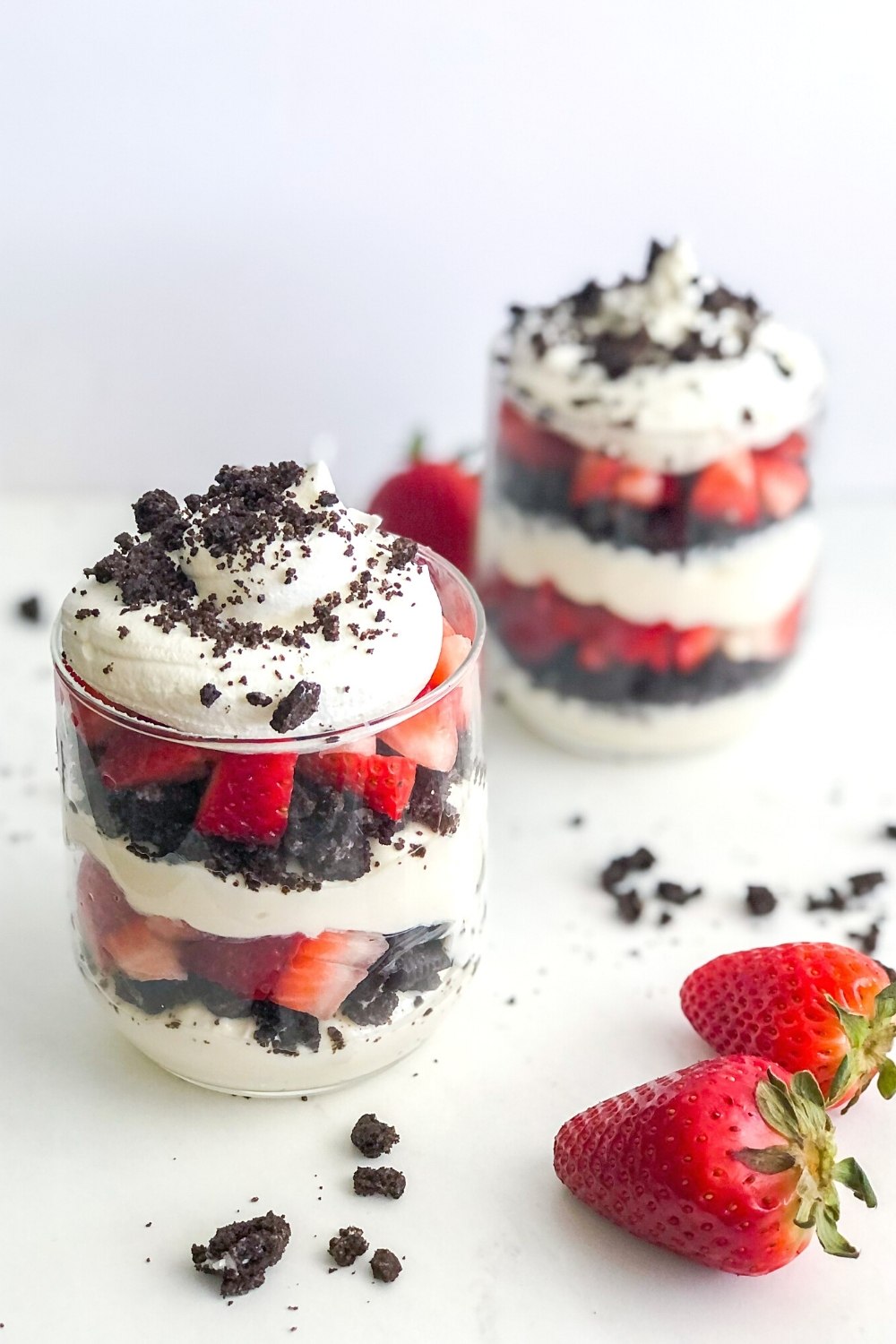 cookies and cream cheesecake cups with strawberries