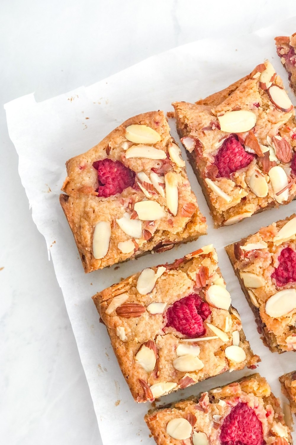 blondie bars sliced on parchment paper