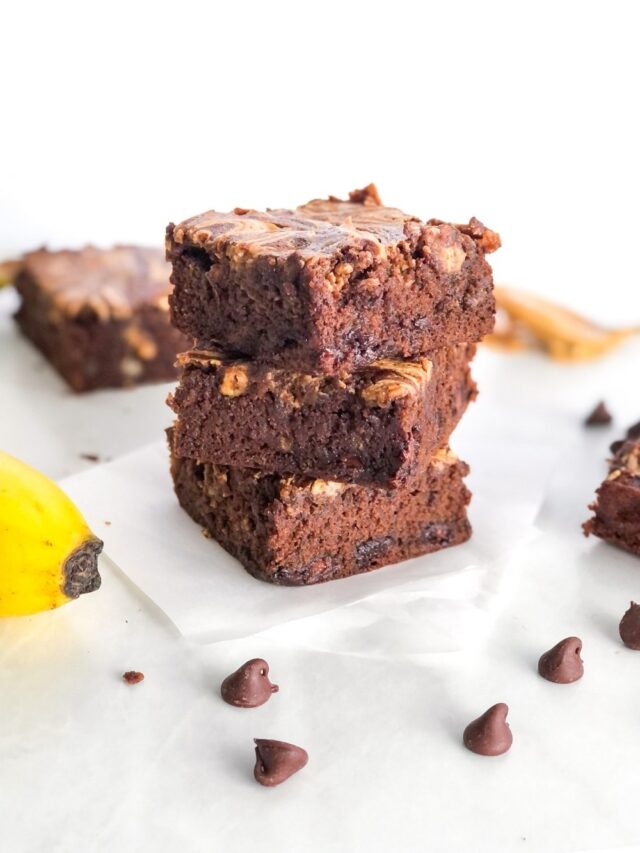 stack of brownies with banana, peanut butter, and chocolate chips