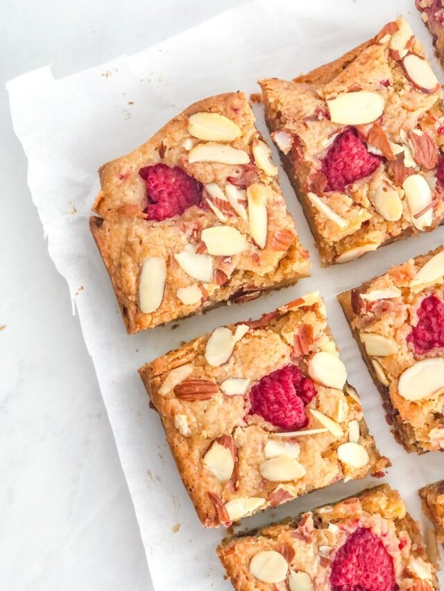 blondie bars sliced on parchment paper