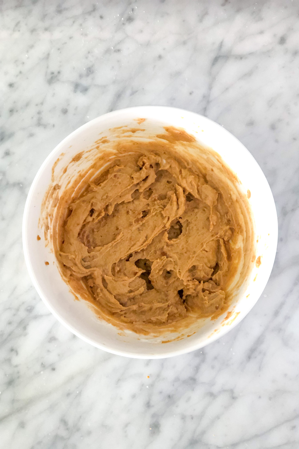 crushed Biscoff cookies mixed with Greek yogurt in a bowl
