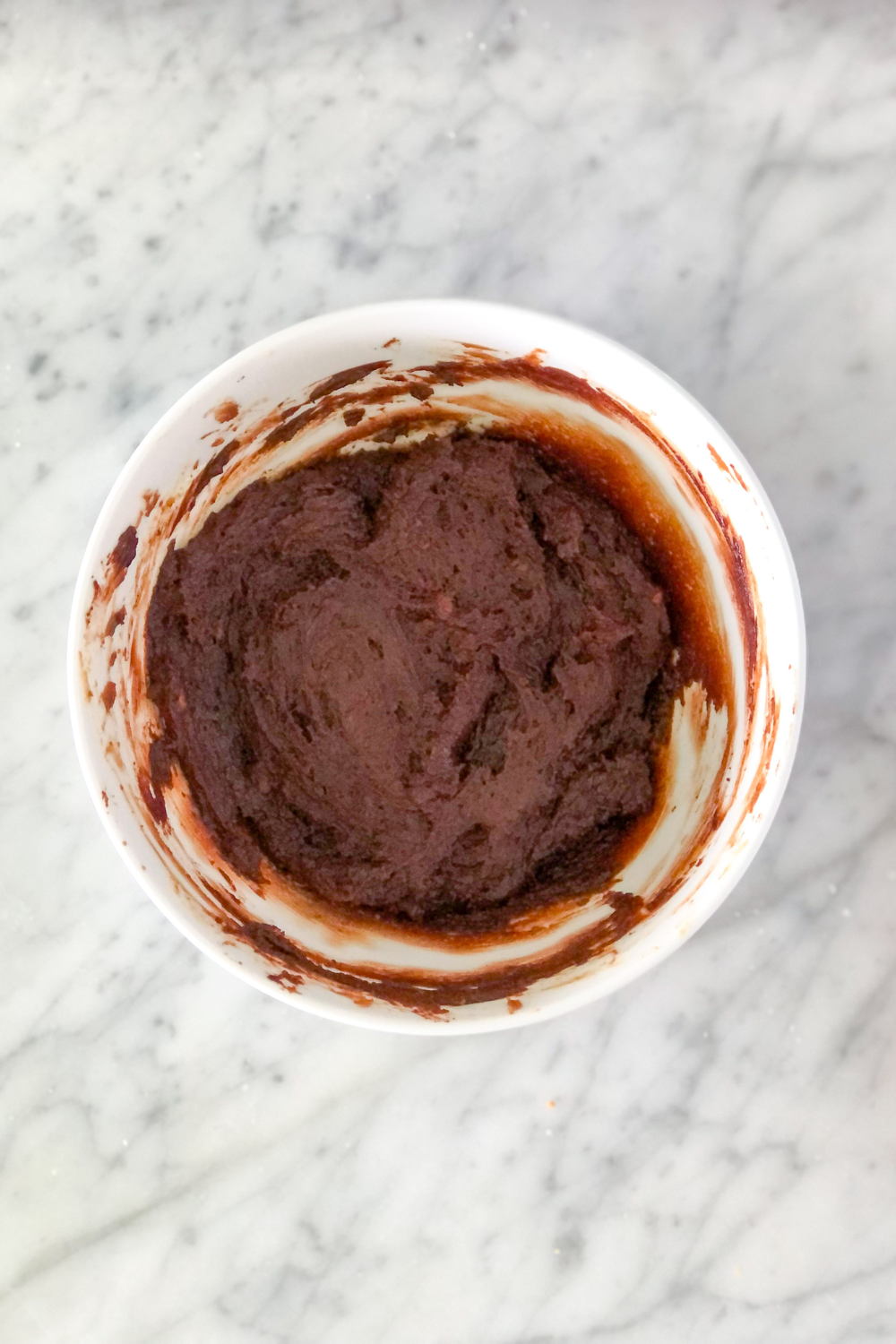 Biscoff brownie truffle ingredients mixed in a bowl