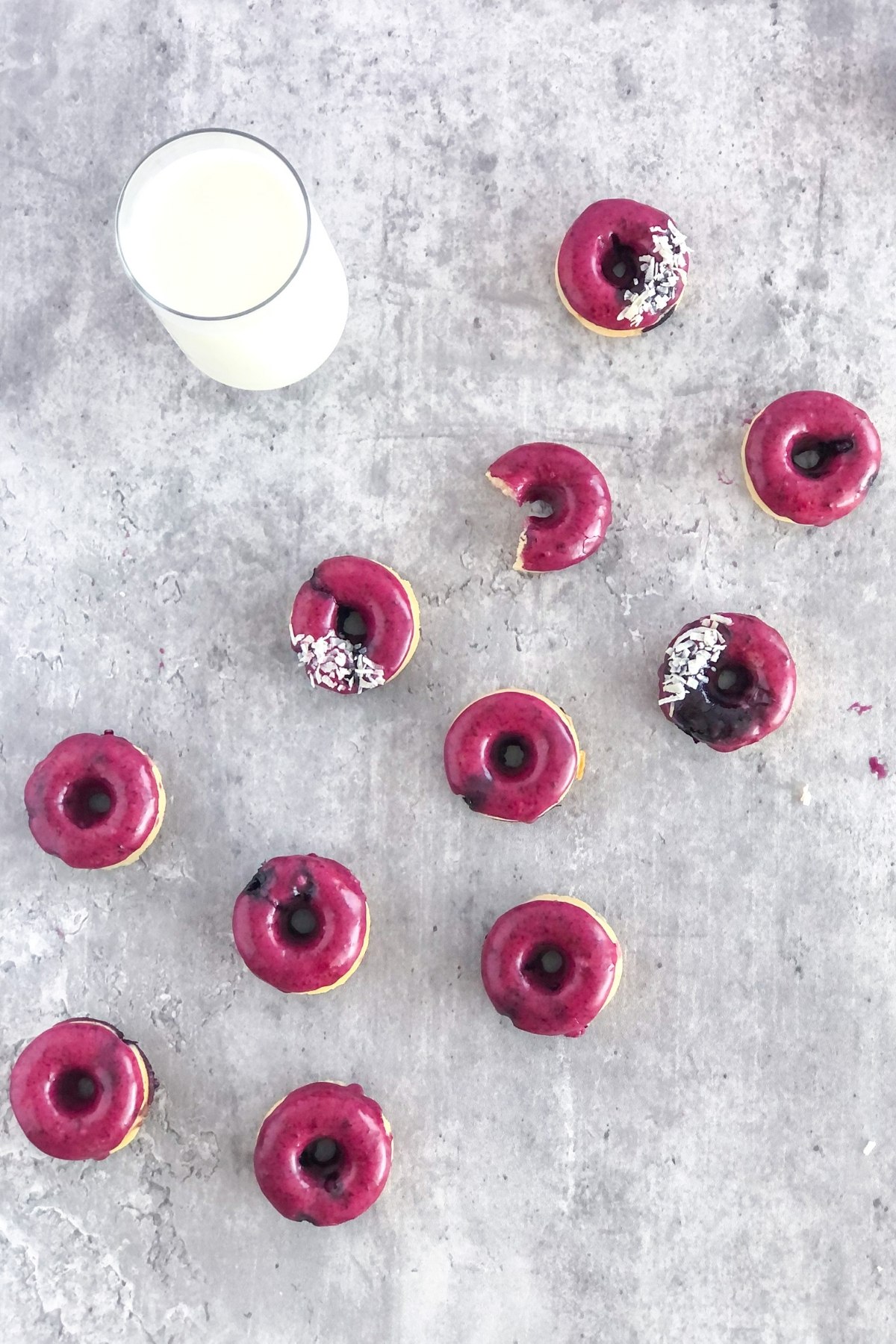 mini baked donuts with blueberry glaze and shredded coconut