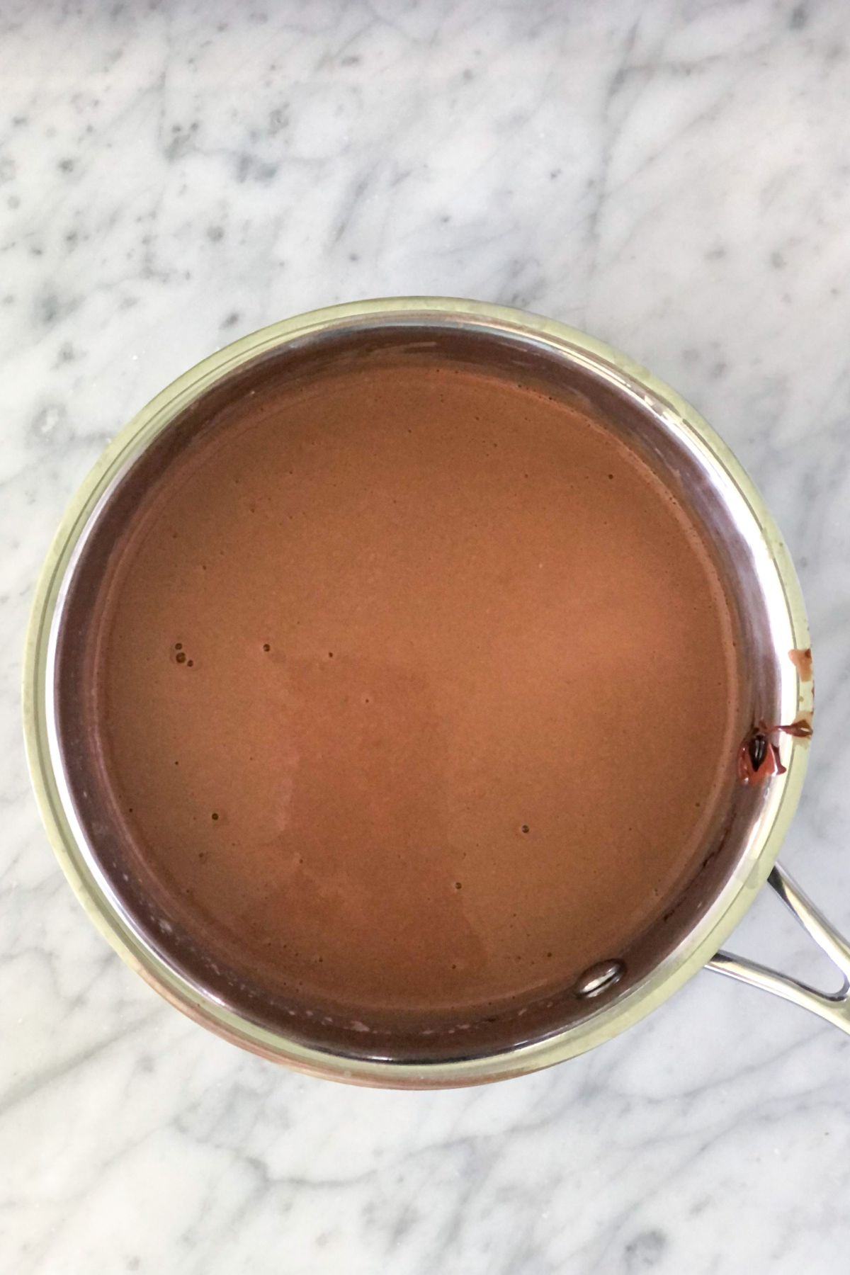 Nutella and chocolate with gelatin in a saucepan