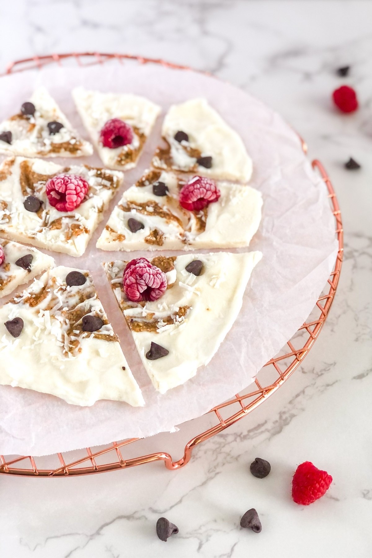almond butter yogurt bark with raspberries and chocolate chips