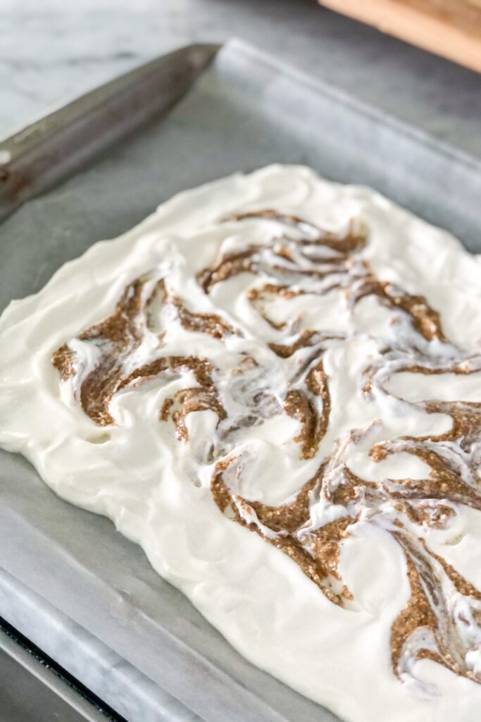almond butter swirled over yogurt mixture