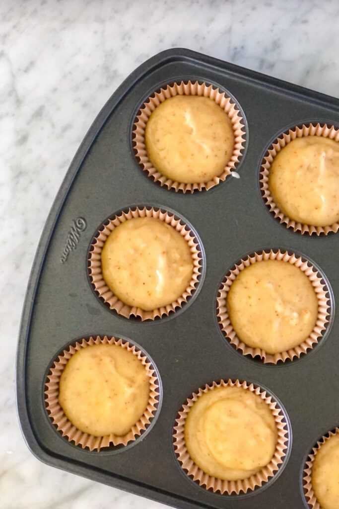 cupcake batter in a muffin tin