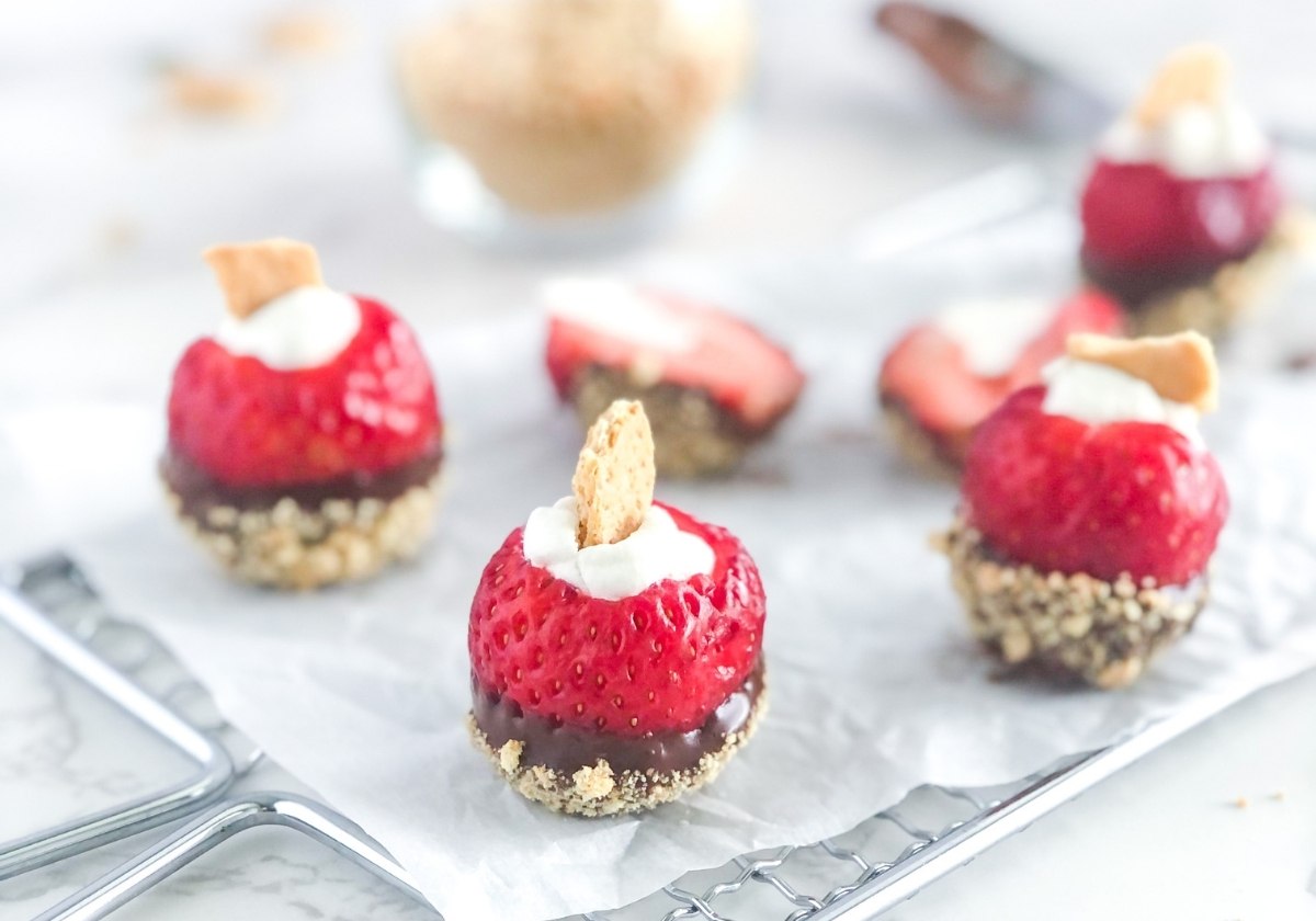 chocolate and Nutella covered strawberry bites filled with whipped cream