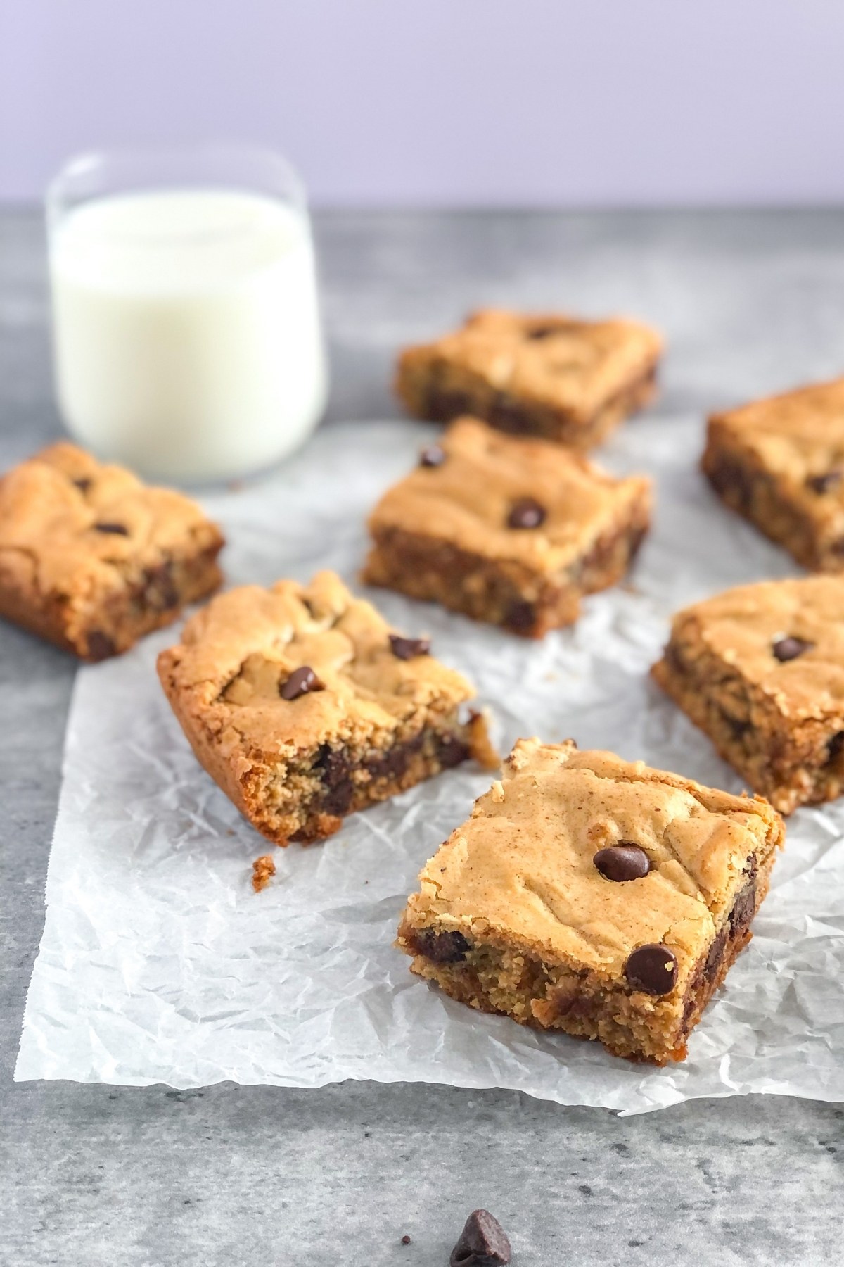 chocolate chip cookie bars on parchment paper
