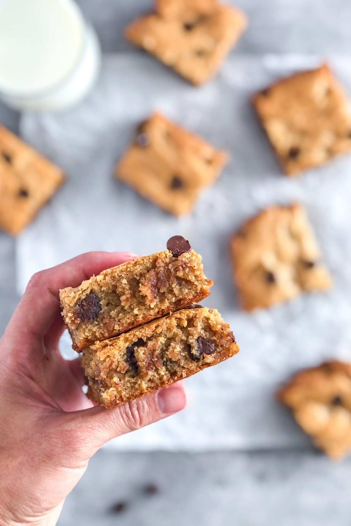 close up of sliced almond butter cookie bars