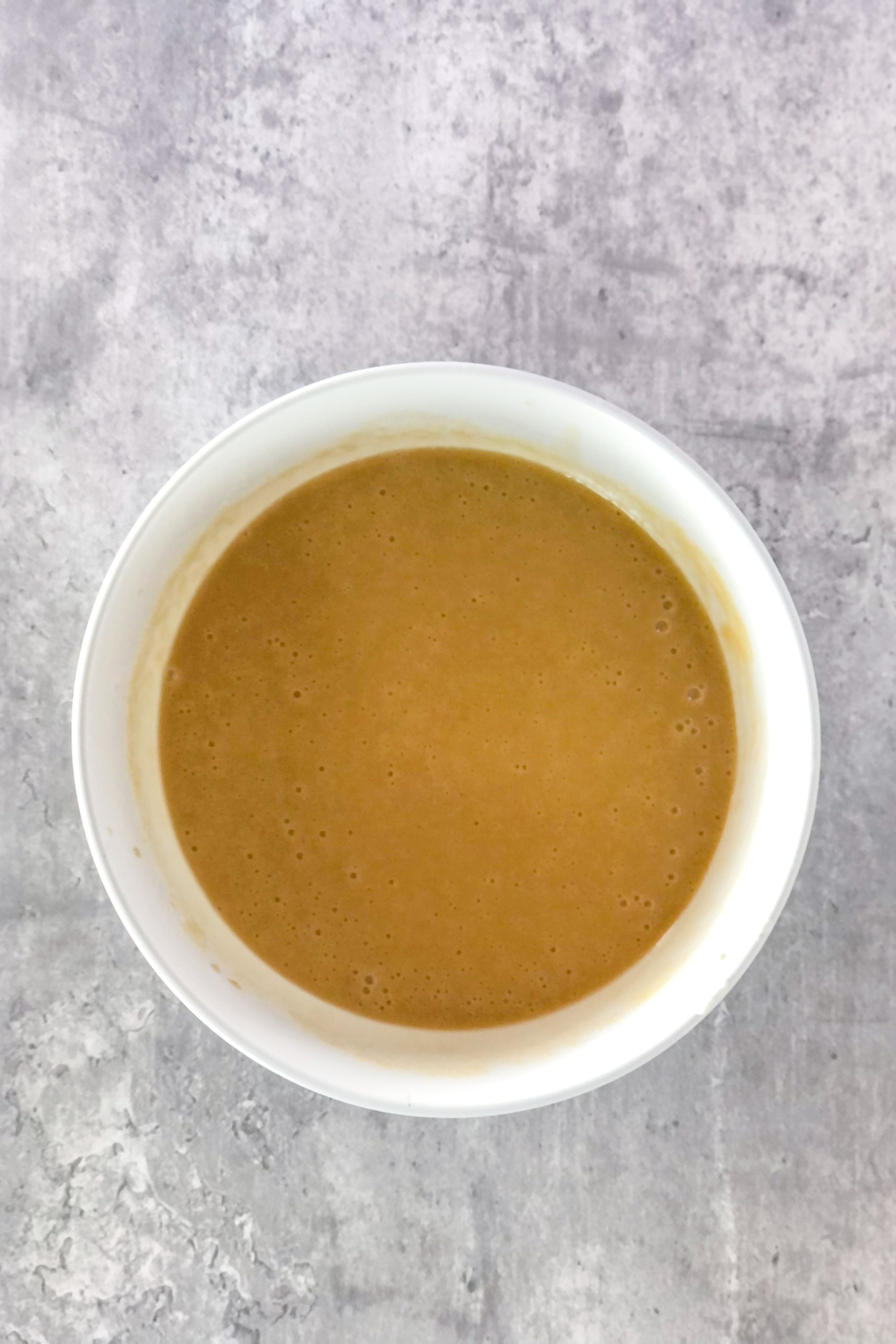 melted butter and sugar in a bowl