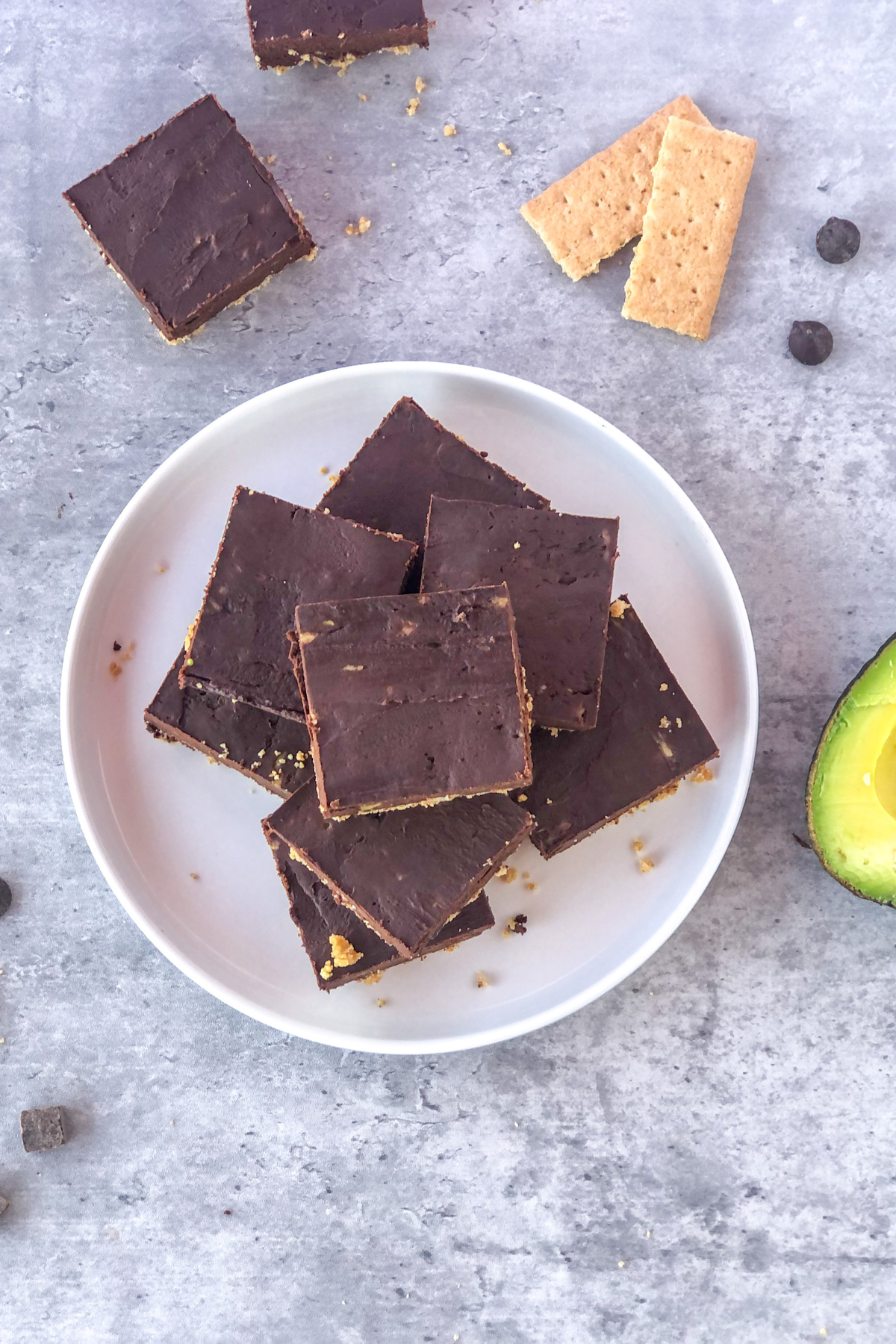 stack of chocolate avocado bars on a white plate