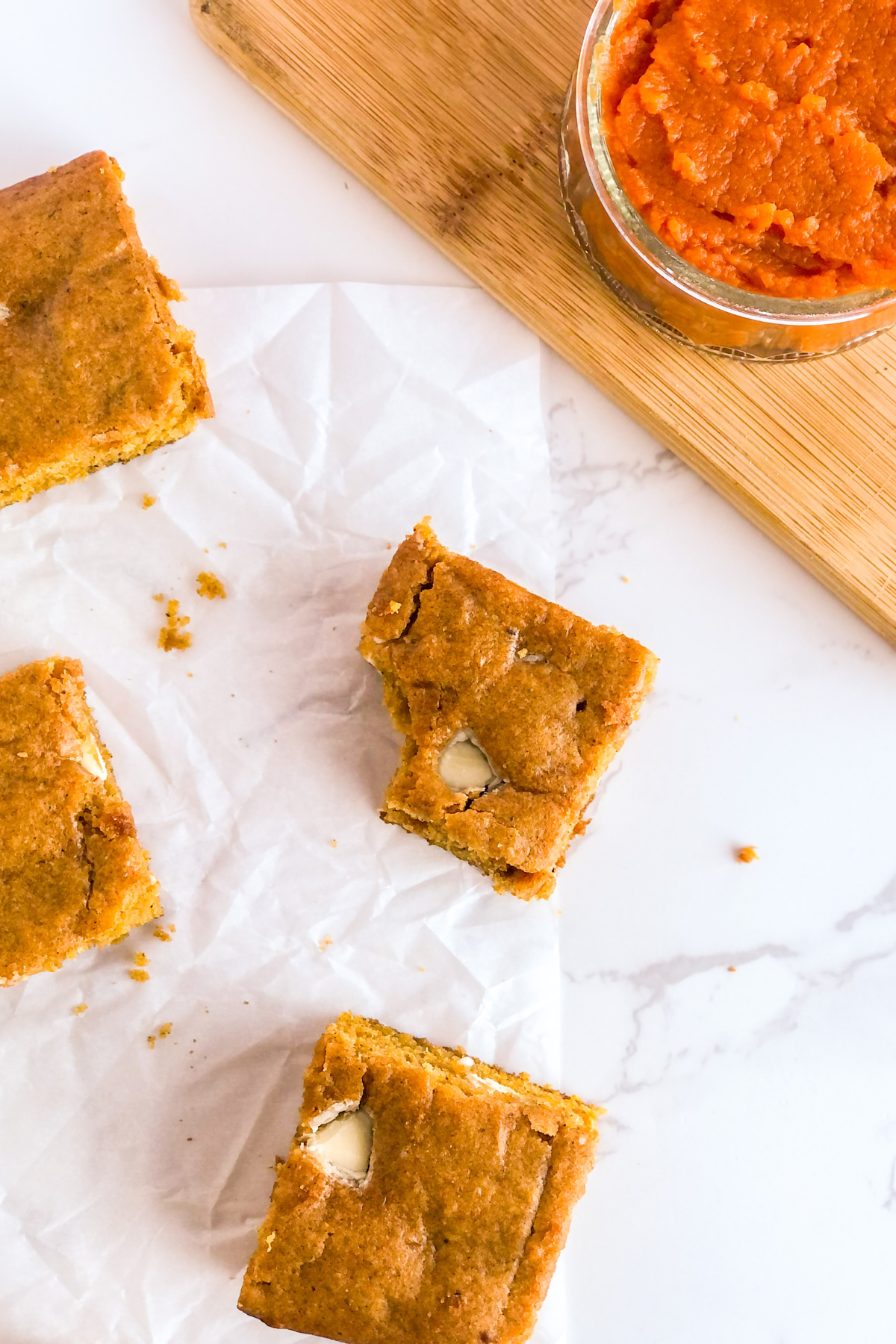 white chocolate pumpkin spice bar with a bite out of it