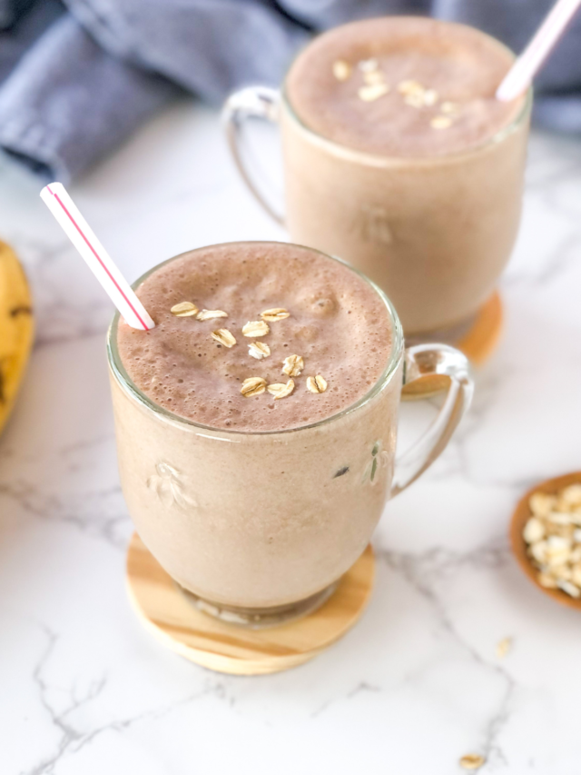 banana Nutella oatmeal smoothie with a blue kitchen towel