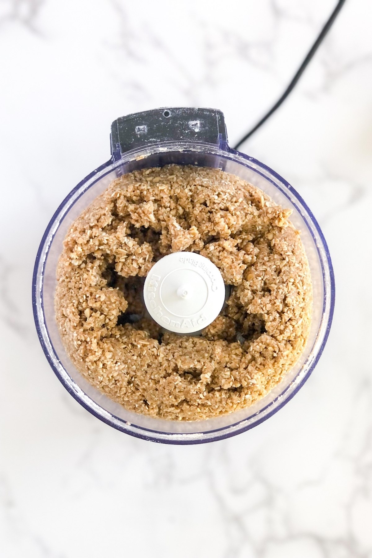 oat flour tart crust mixture in a food processor