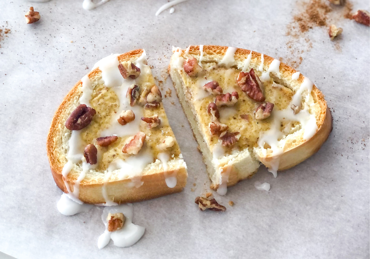 slice of chai custard toast with pecan icing