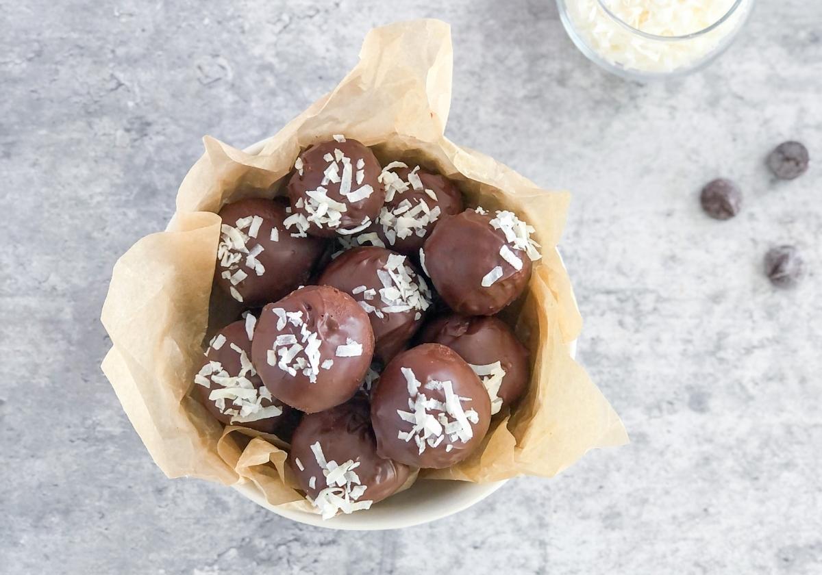 dark chocolate coconut bites in a bowl