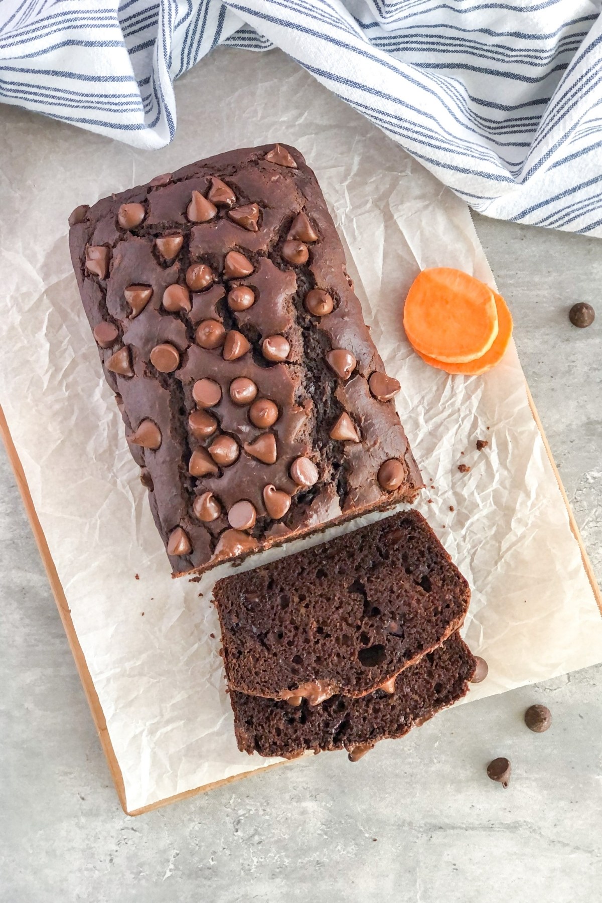 double chocolate sweet potato bread sliced on a cutting board