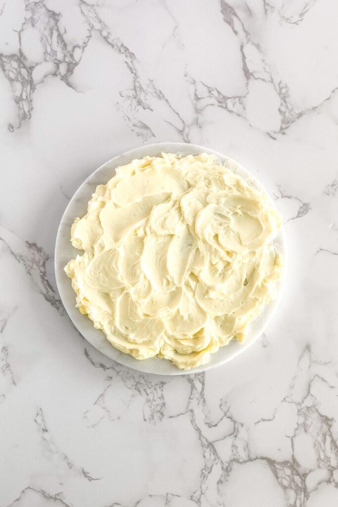 softened butter spread on a marble platter