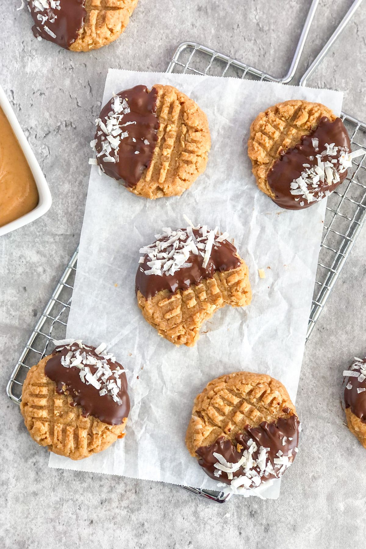 chocolate coconut cookies with peanut butter on parchment paper