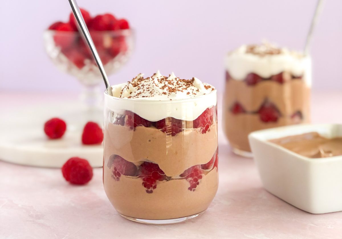 chocolate yogurt parfaits with raspberries and whipped cream